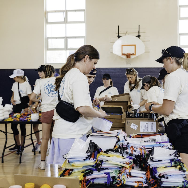 Packing Backpacks for The Boys & Girls Clubs